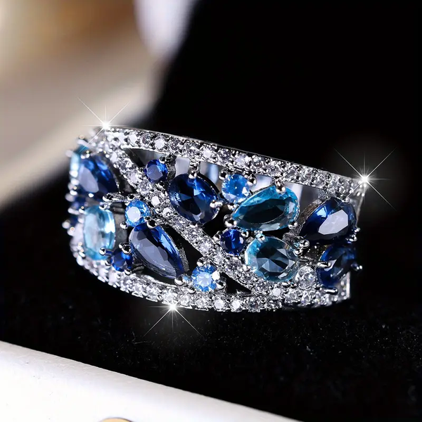 Anillo vintage azul con brillos · Plateado