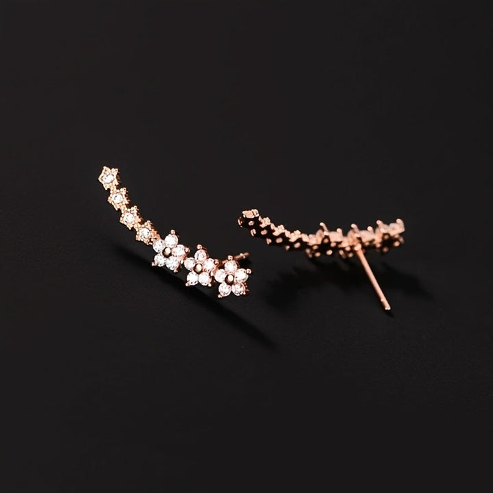 Pendientes trepadores de flores · Dorado, plateado o rosado