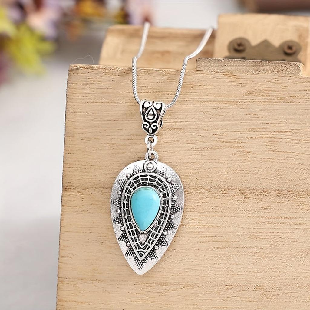 Collar Arlisse con gota turquesa · Plateado
