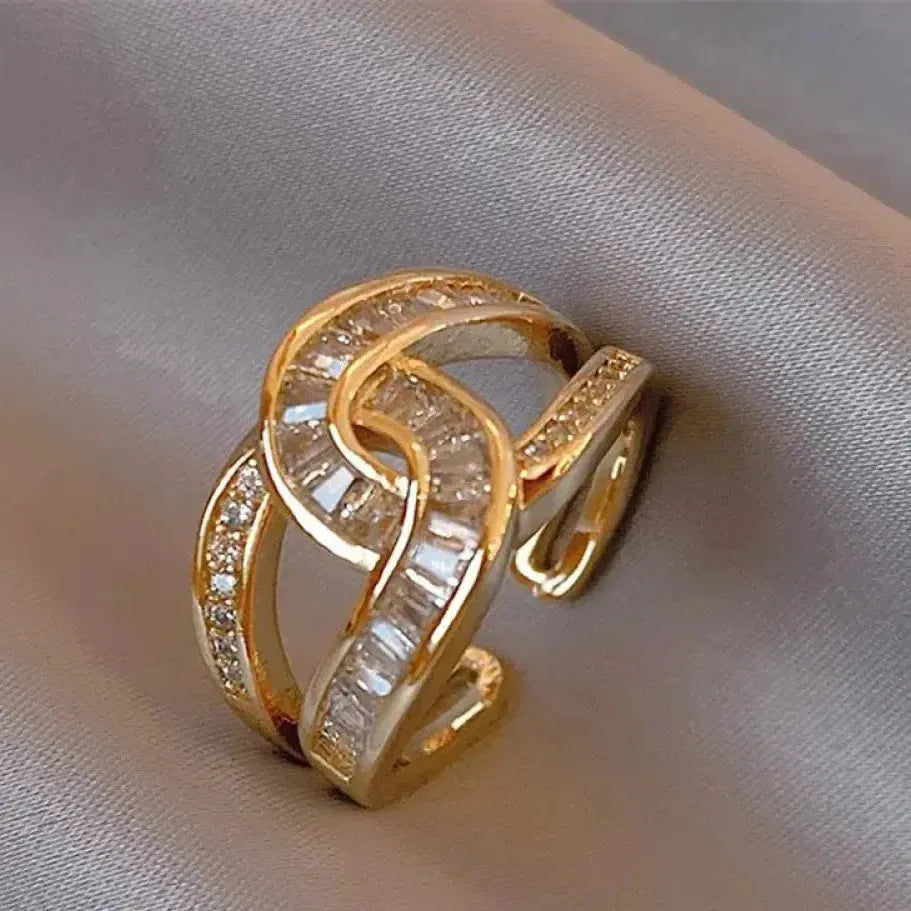 Anillo lazo con brillo · Dorado