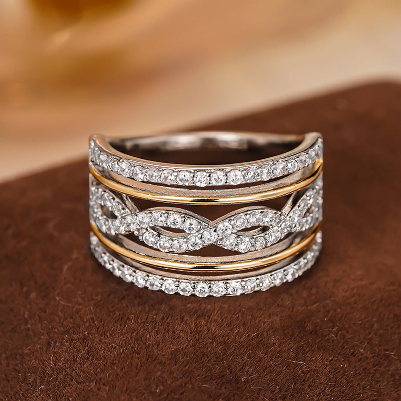 Anillo estrella con brillos · Bicolor