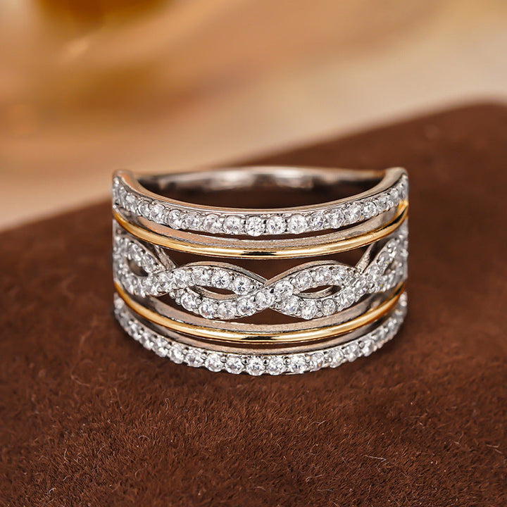 Anillo estrella con brillos · Bicolor