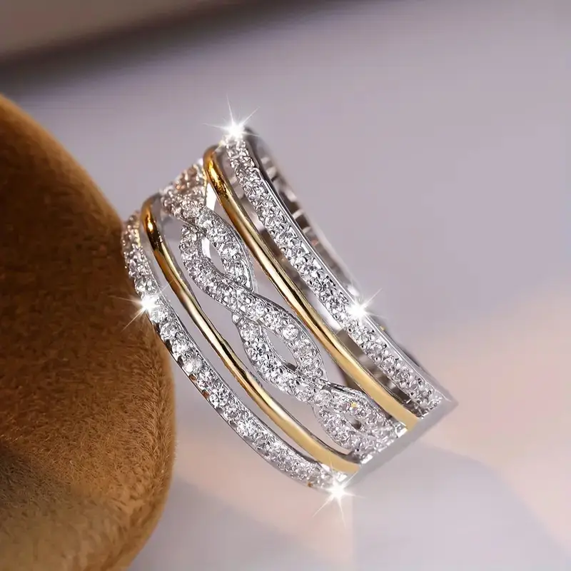Anillo estrella con brillos · Bicolor