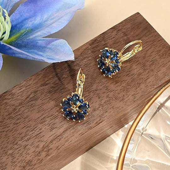 Pendientes Calina de flor · Dorado