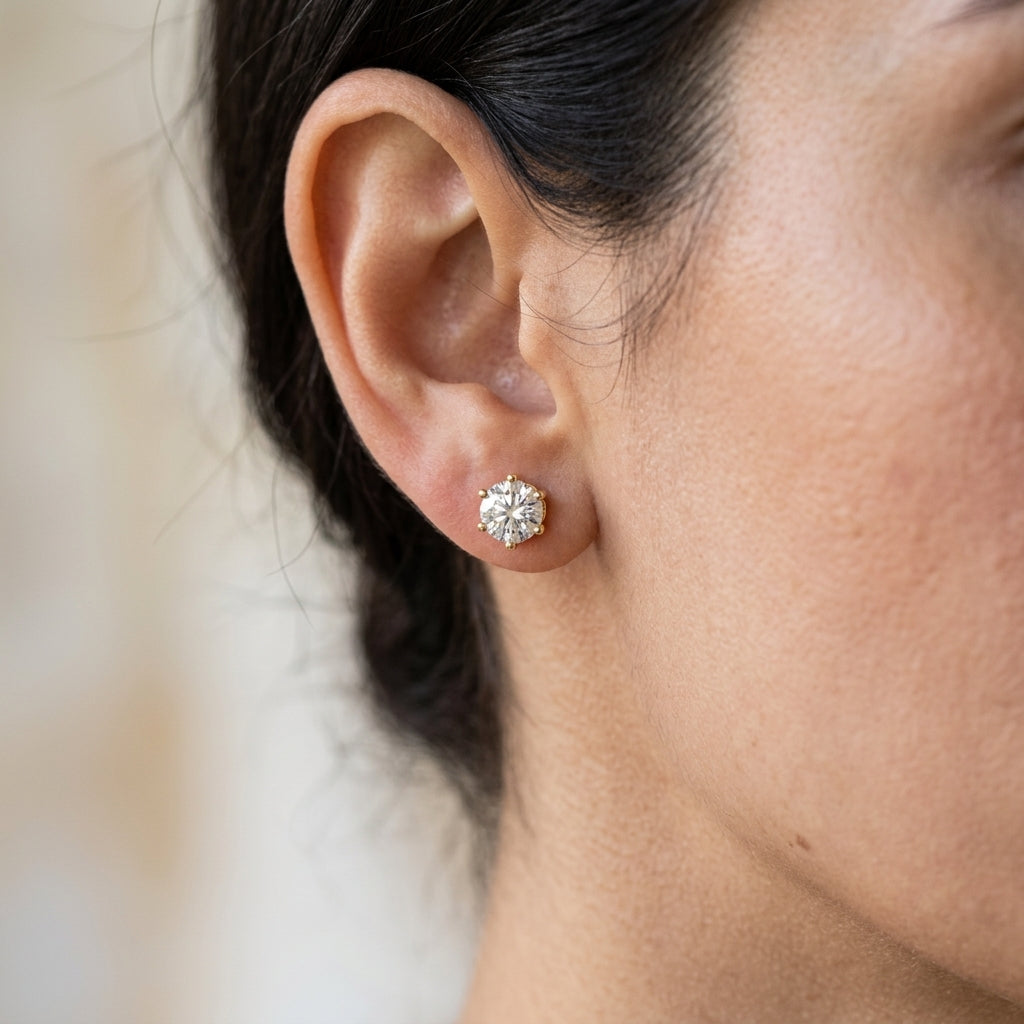 Pendientes con destello · Dorado