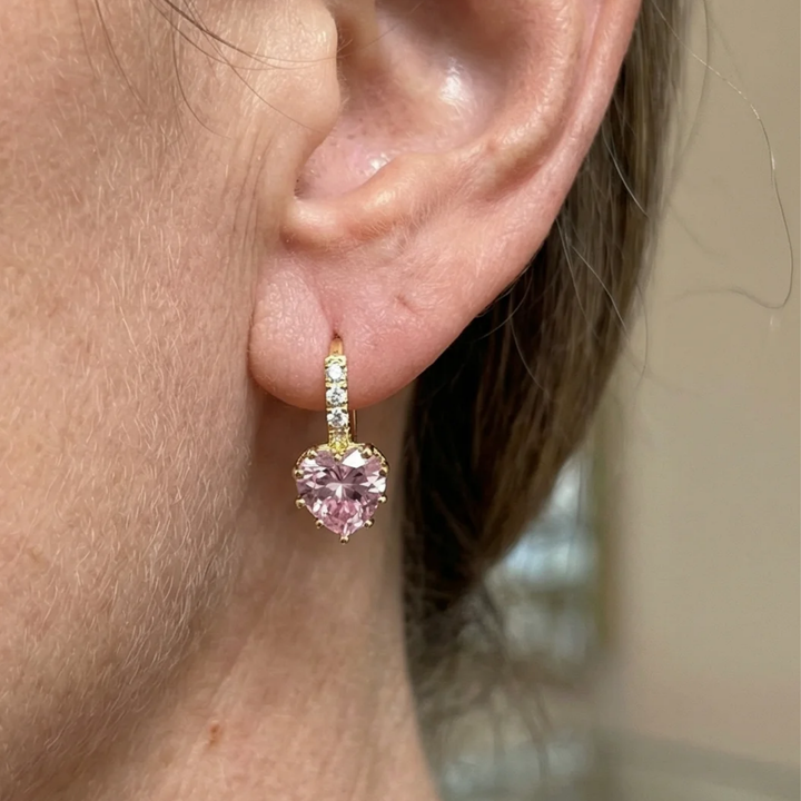 Pendientes huggie Destello Cupido · Dorado