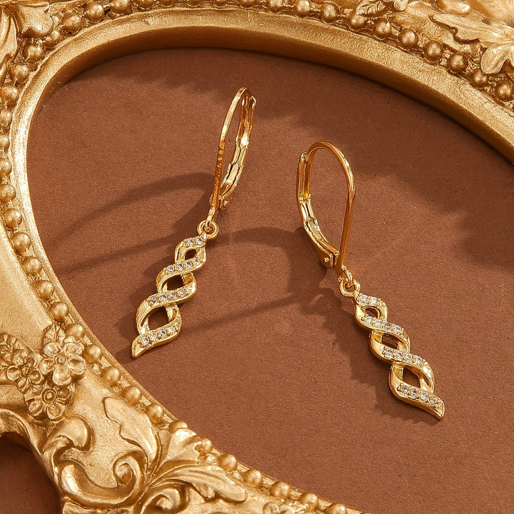Pendientes largos trenzados · Dorado