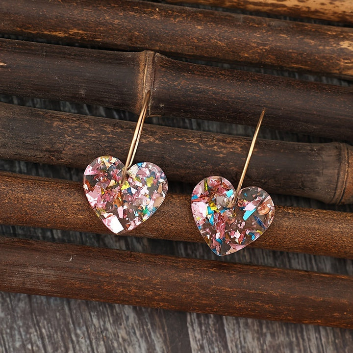 Pendientes de corazón · Dorado