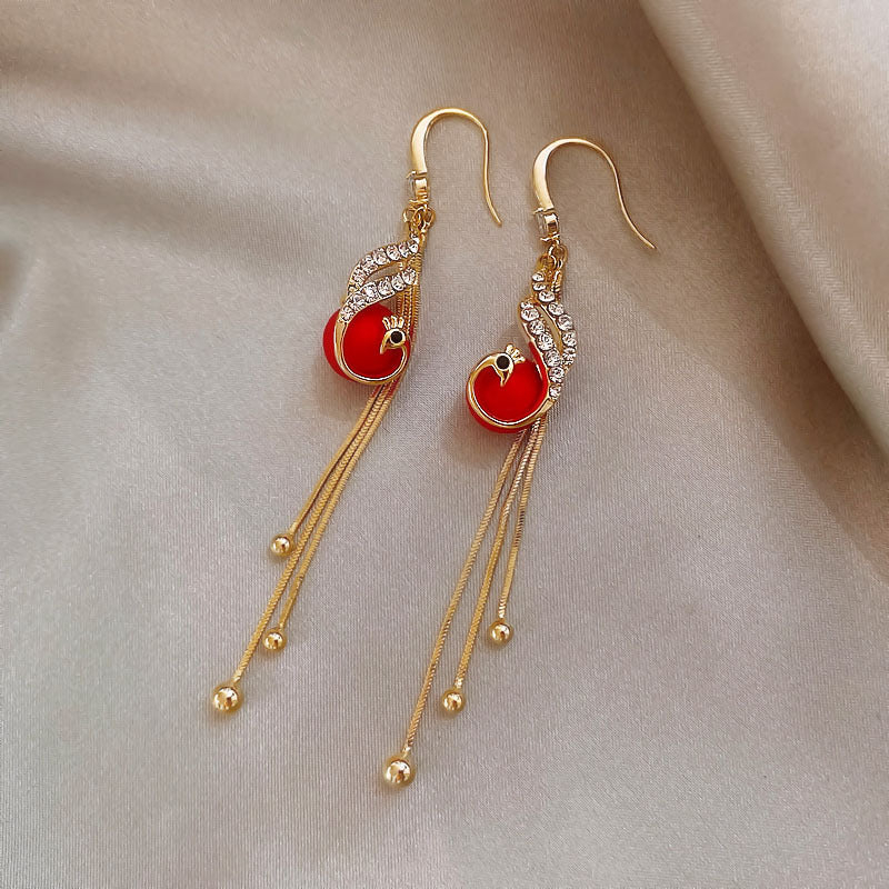 Pendientes de fiesta con margaritas · Dorado