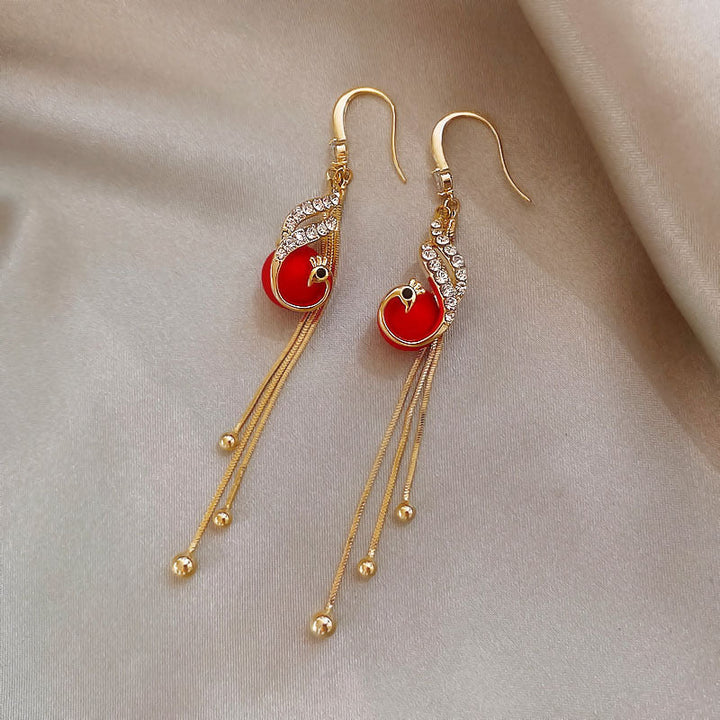 Pendientes de fiesta con margaritas · Dorado