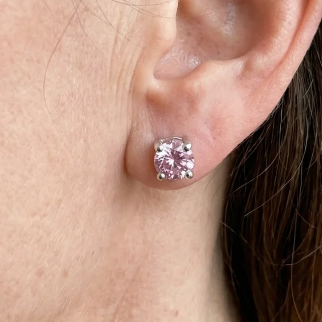 Pendientes redondos rosa con brillos · Plateado