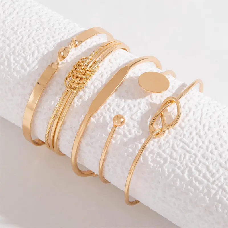 Pulsera Éléganse anudada · Dorado o plateado