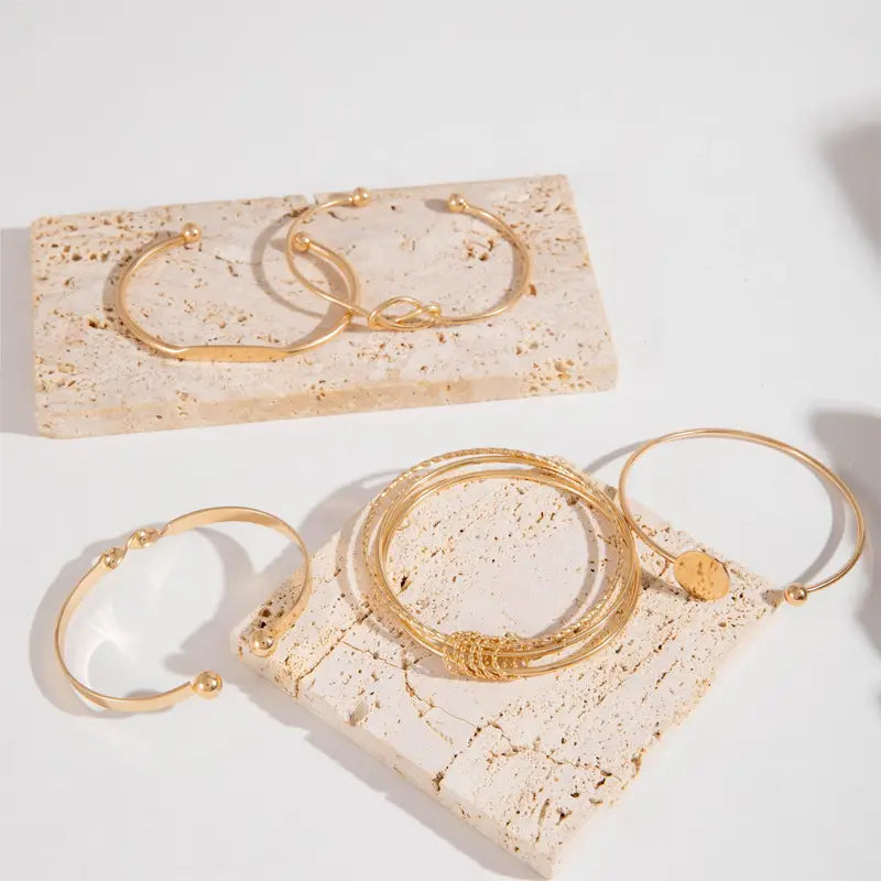 Pulsera Éléganse anudada · Dorado o plateado