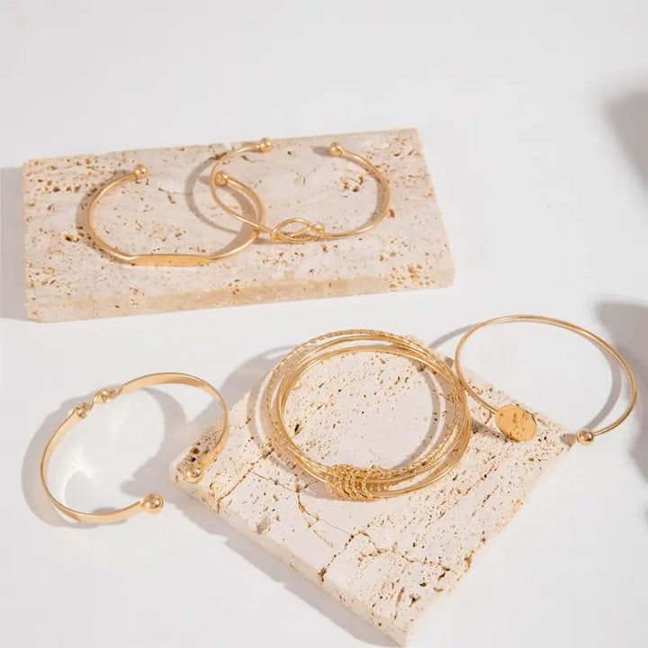 Pulsera Éléganse anudada · Dorado o plateado