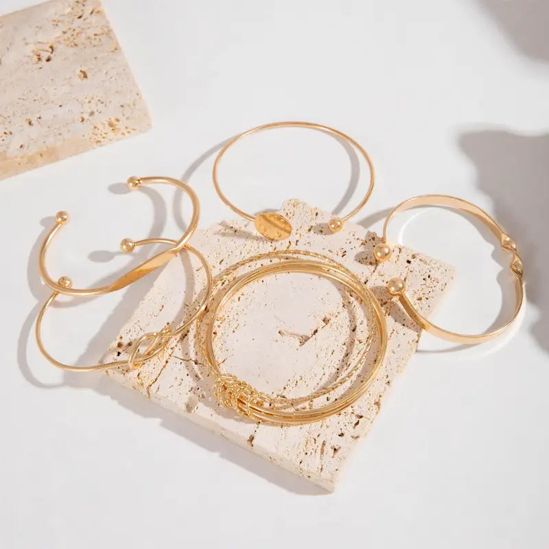 Pulsera Éléganse anudada · Dorado o plateado