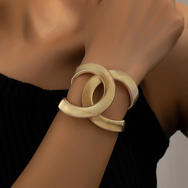 Brazalete doble cruzado · Dorado