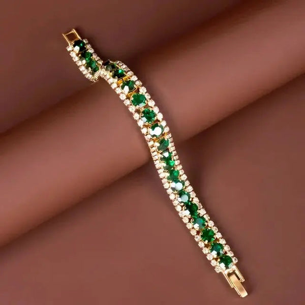 Pulsera con detalle verde · Dorado