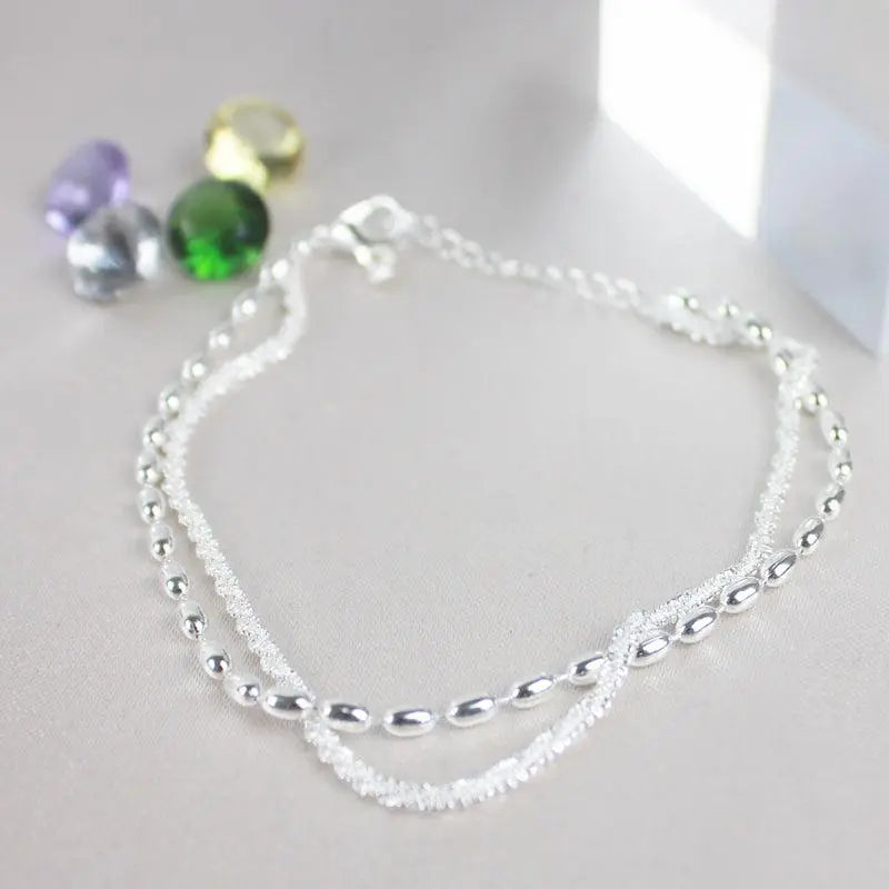 Pulsera con brillos · Plateado