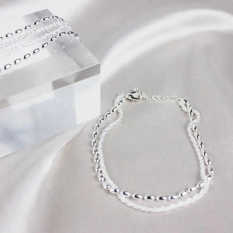 Pulsera con brillos · Plateado