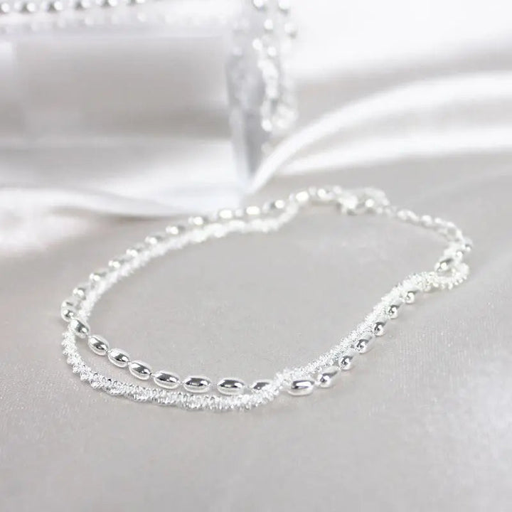 Pulsera con brillos · Plateado