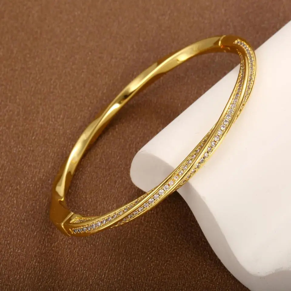 Brazalete doble con brillos · Dorado