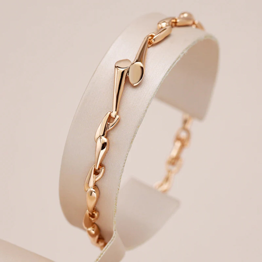 Pulsera fina con brillos · Rosado
