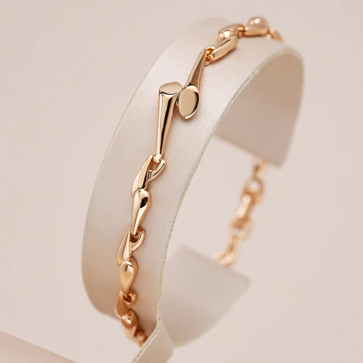 Pulsera fina con brillos · Rosado