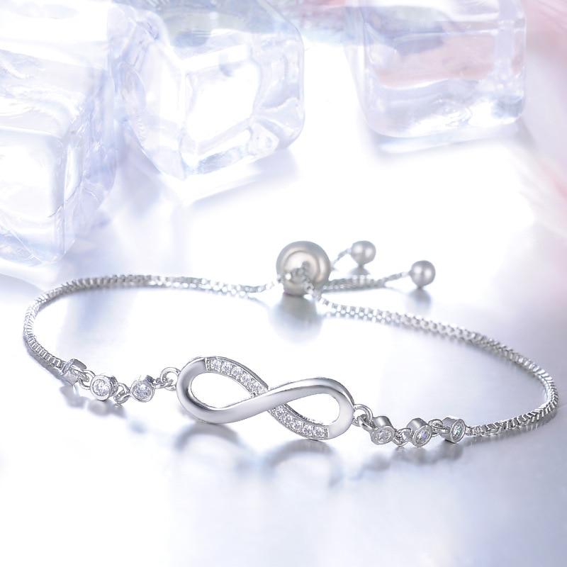 Pulsera infinito ajustable · Dorado, plateado o rosado