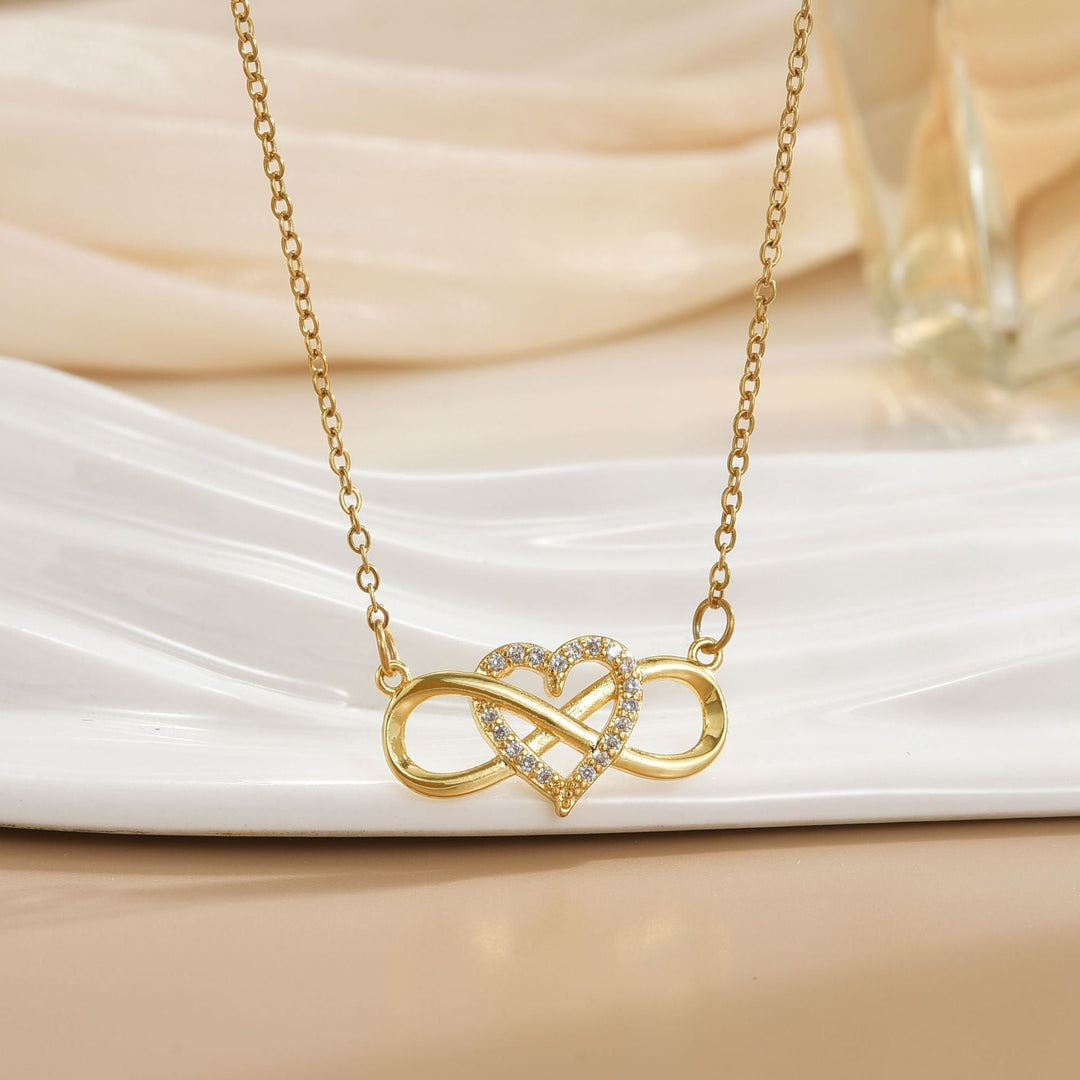 Collar infinito con nudo de amor · Dorado