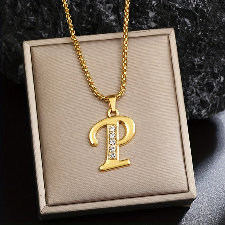 Collar con inicial y brillo · Dorado