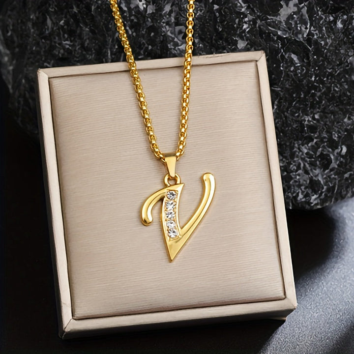 Collar con inicial y brillo · Dorado