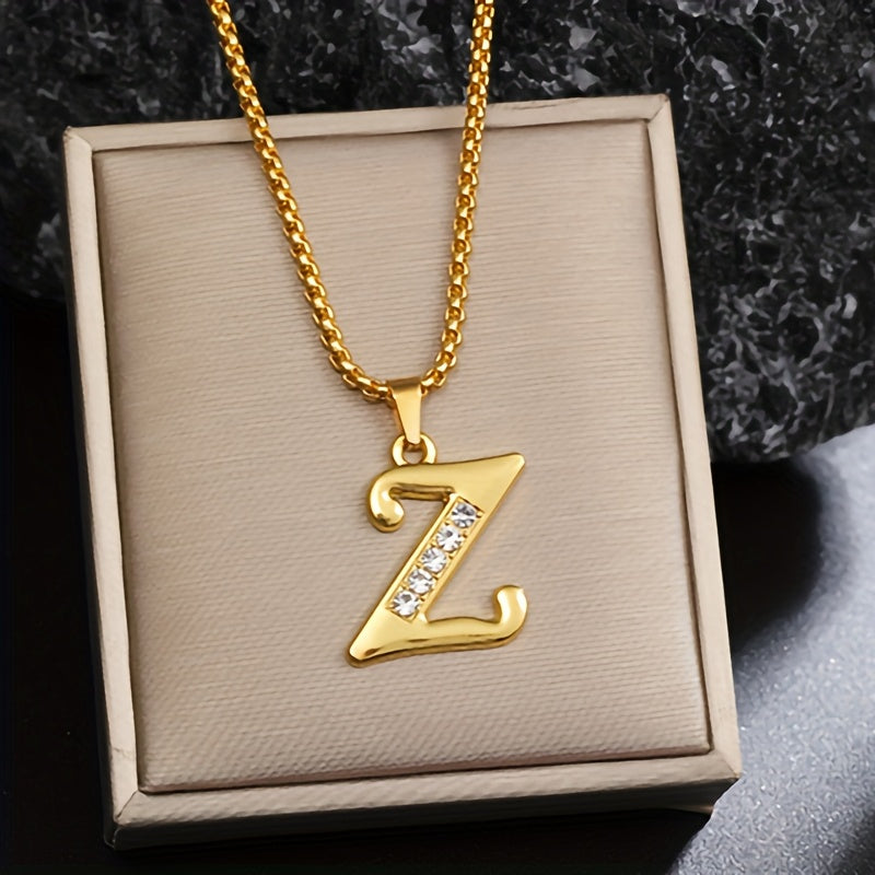 Collar con inicial y brillo · Dorado