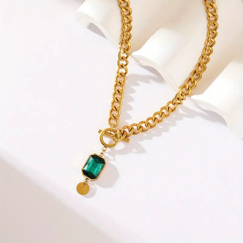 Collar de cadena gruesa con colgante verde esmeralda · Dorado