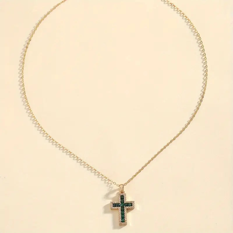 Collar con cruz verde esmeralda · Dorado