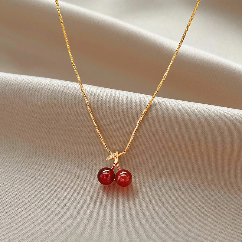 Collar de cerezas · Dorado