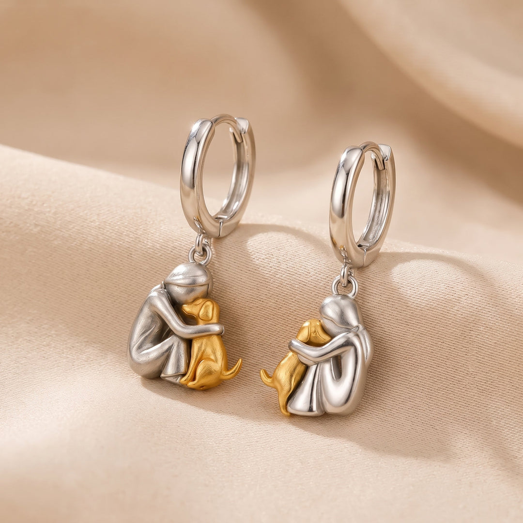 Pendientes abrazo mujer y perro