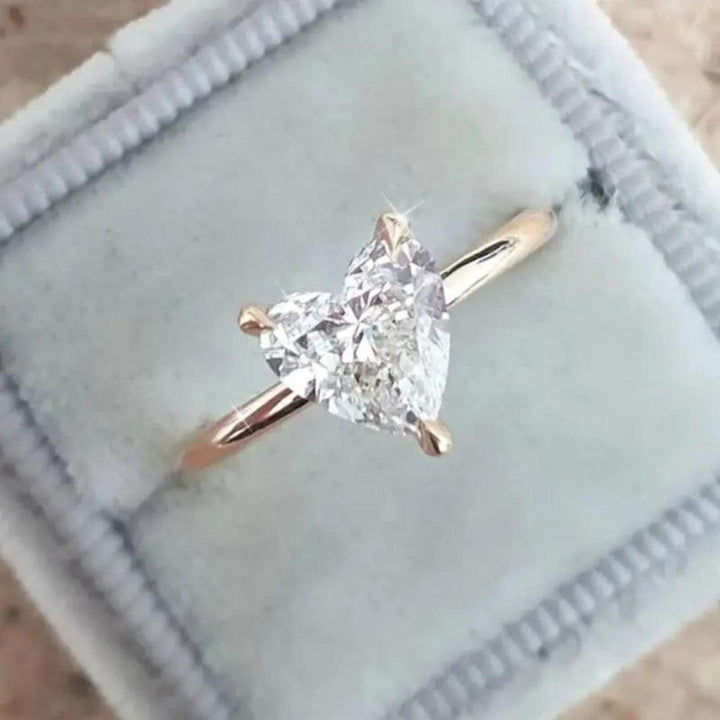 Anillo fino con corazón de brillo · Rosado