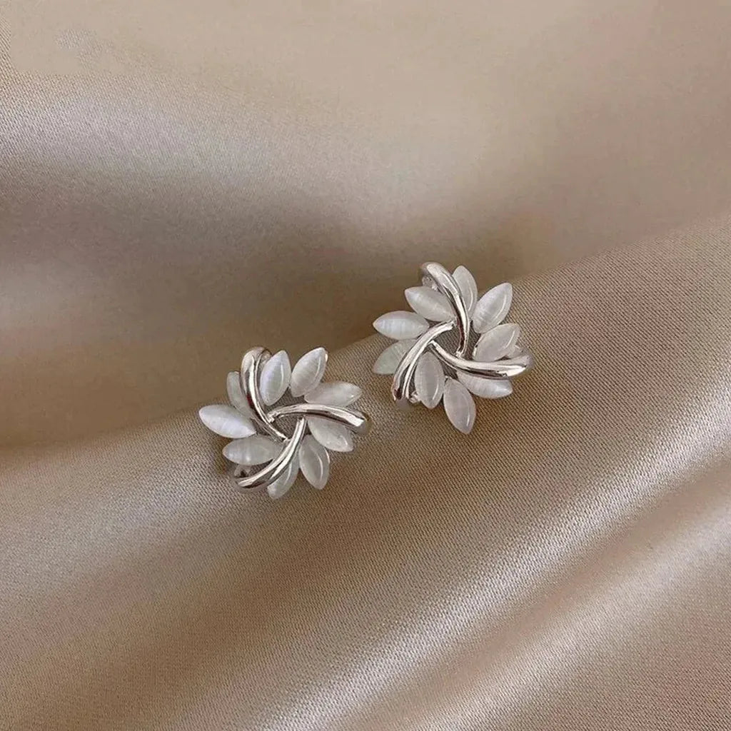 Pendientes de flor efecto ópalo · Dorado o plateado