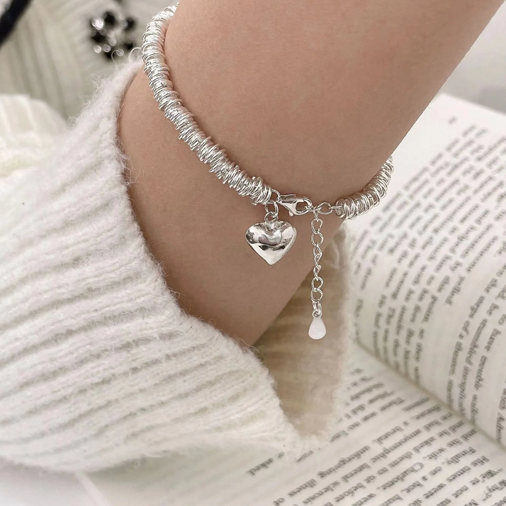 Pulsera de anillas con corazón · Plateado
