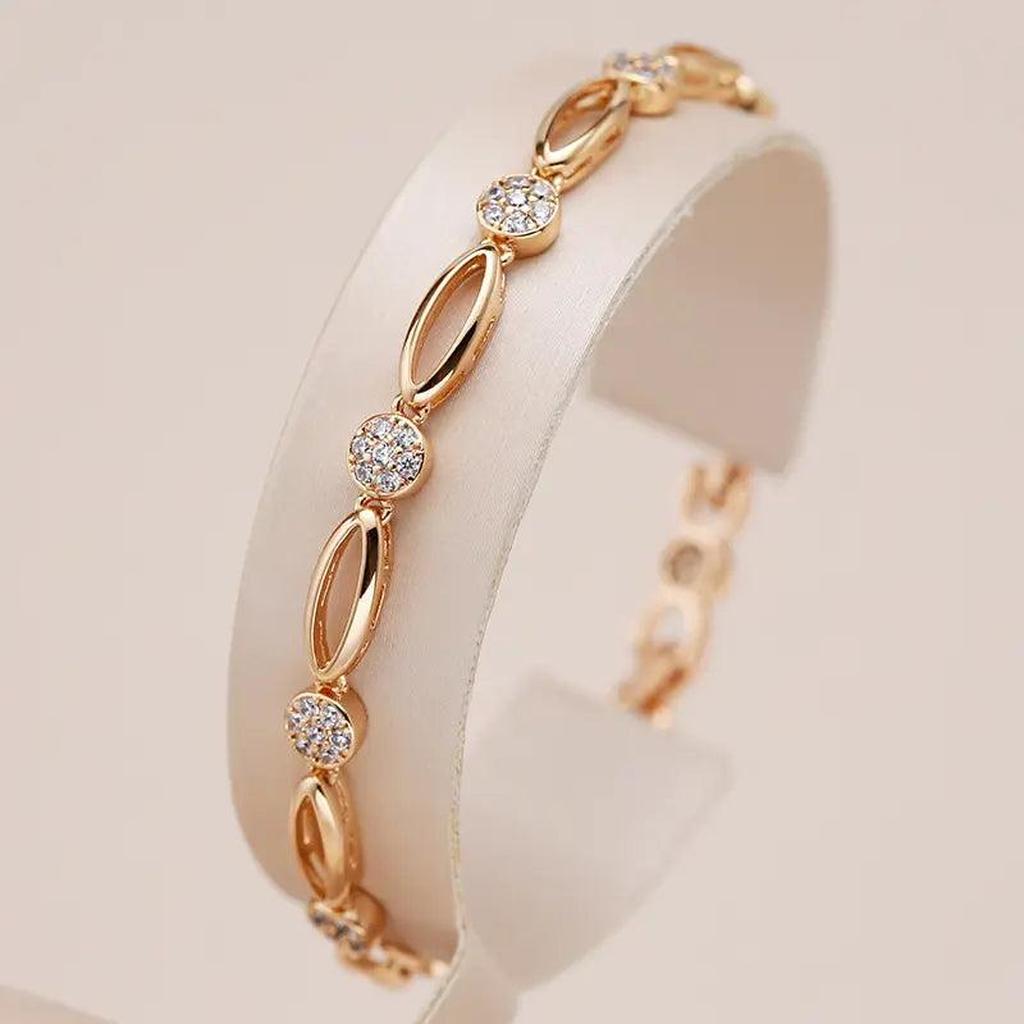 Pulsera de óvalos con brillos · Rosado