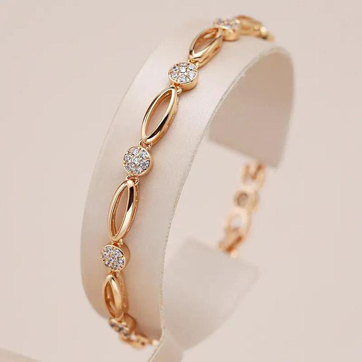 Pulsera de óvalos con brillos · Rosado