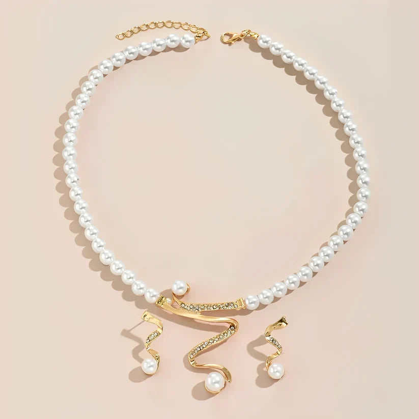 Conjunto regalo perlado: collar y pendientes · Dorado