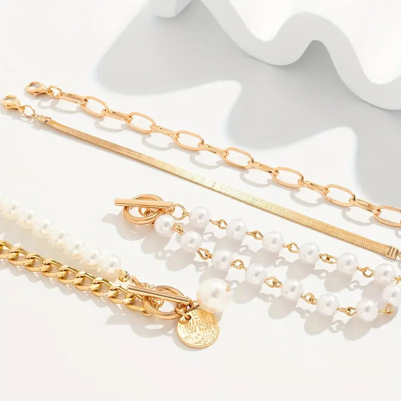 Set de pulseras con serpiente y eslabones · Dorado