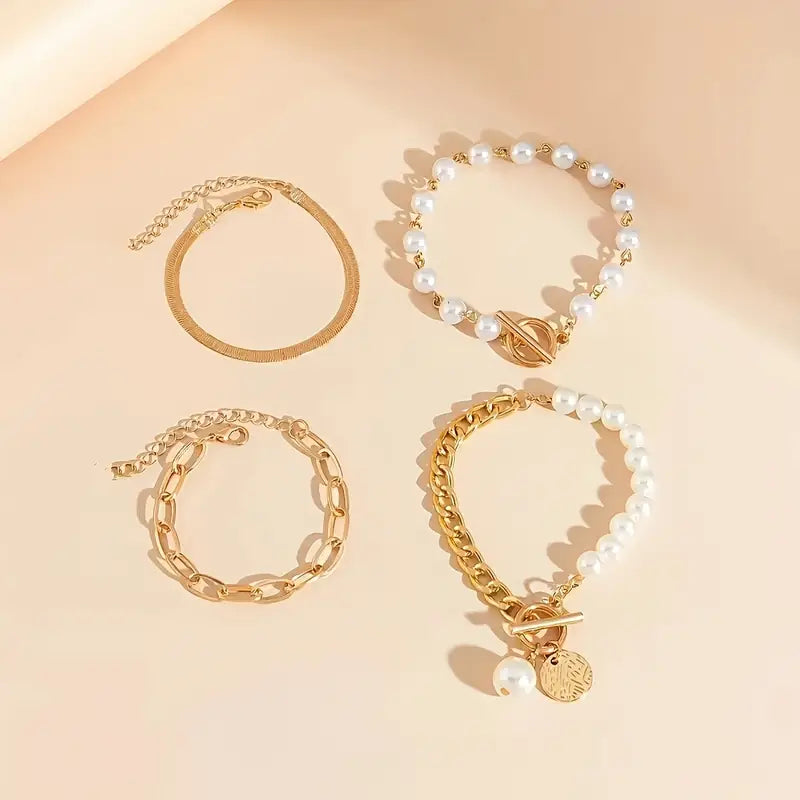 Set de pulseras con serpiente y eslabones · Dorado