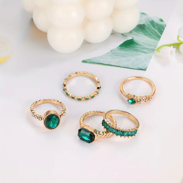 Set de anillos verde esmeralda · Dorado
