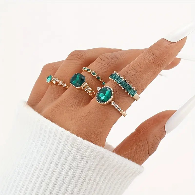 Set de anillos verde esmeralda · Dorado