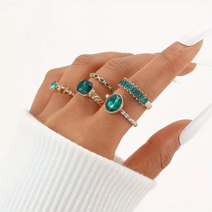 Set de anillos verde esmeralda · Dorado