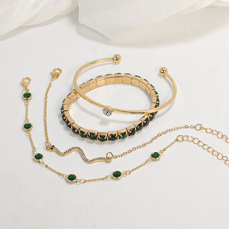 Set de pulseras verde esmeralda · Dorado