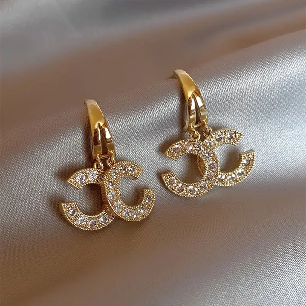 Pendientes de aro con colgante entrelazado · Dorado