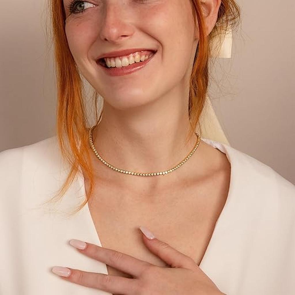 Collar tenis con brillos · Dorado